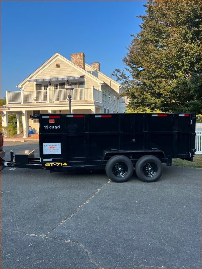 The ExtraHands ASAP 15 cubic yard dump trailer on a Monmouth County clean-out